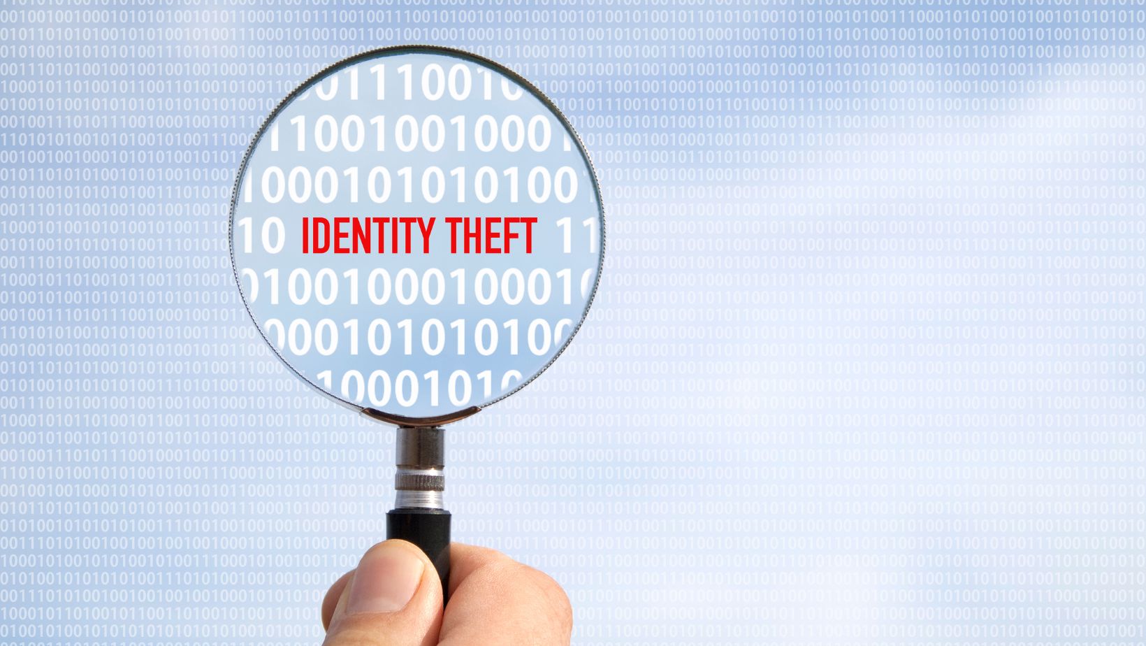 magnifying glass with identity theft 