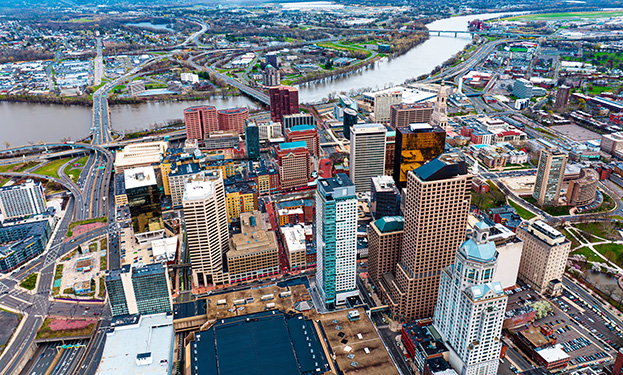 A birds eye view photo of Hartford, Connecticut including the river.