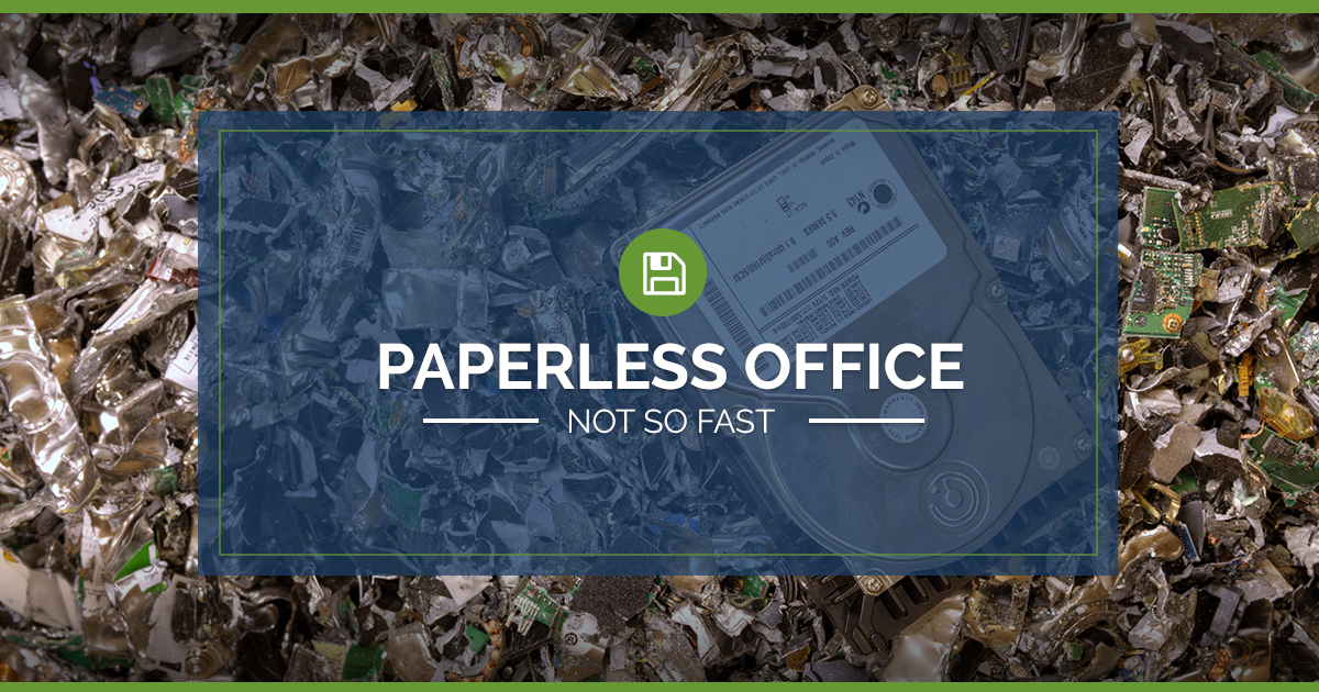 Want a Paperless Office? Not So Fast! hard drive on pile of shredded microchips