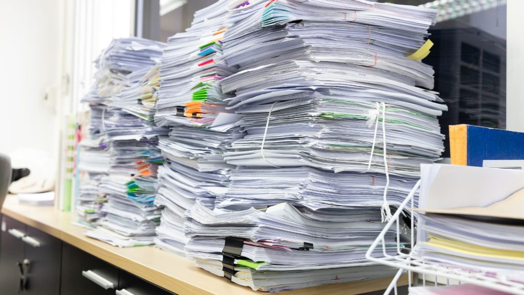 A stack of documents for an office cleanout